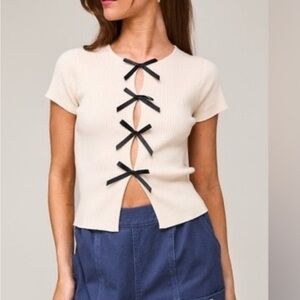 Stylish Cream Top with Black Accents